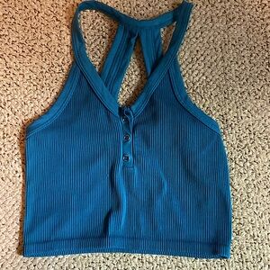 This is a blue cropped workout top from Free People Movement.